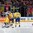 PRAGUE, CZECH REPUBLIC - MAY 9: Sweden's Jhonas Enroth #1, Oliver Ekman-Larsson #23 and Elias Lindholm #28 look on as Switzerland's Simon Bodenmann #23 celebrates after scoring a third period goal during preliminary round action at the 2015 IIHF Ice Hockey World Championship. (Photo by Andre Ringuette/HHOF-IIHF Images)

